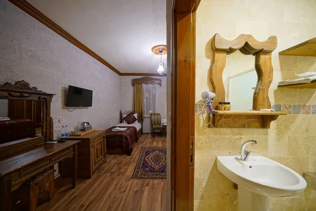 غرفة كومفورت ثلاثية بسرير كوين وسرير فردي، Arch Palace Hotel 8/9