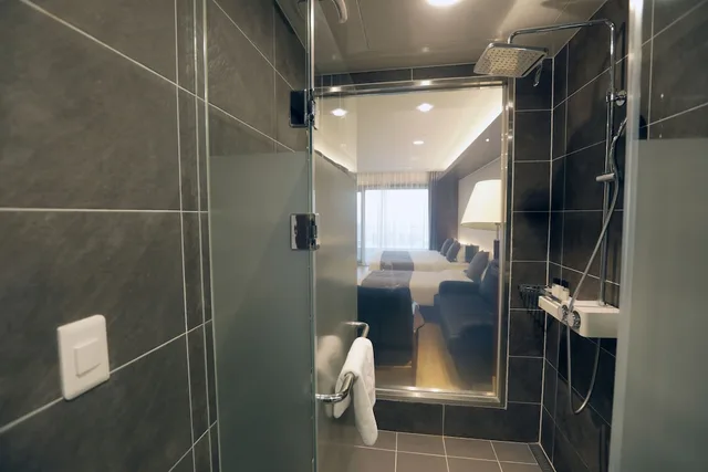 غرفة عائلية بسريرين منفصلين وسرير كينج وسرير فردي، The Qube Resort Jeju 4/5