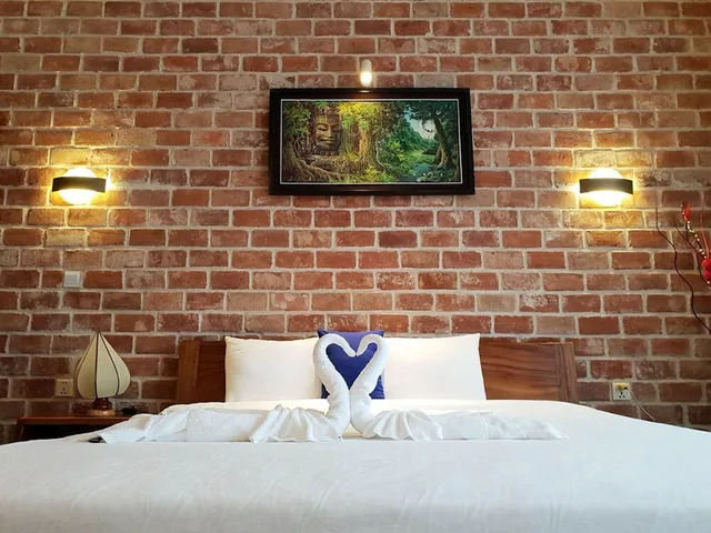 غرفة بريميير بسرير كينج بإطلالة على الحديقة بشرفة، D.I Residence Boutique Hotel 1/2