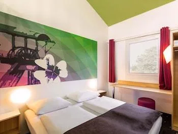 غرفة رباعية بسرير بطابقين وسرير كوين، B&B Hotel Bochum-Herne 1/11