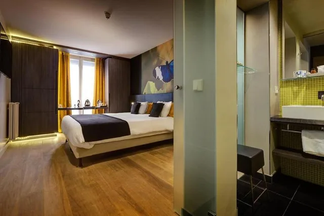 غرفة ديلوكس بسرير كوين وسريرين منفصلين، Hotel Elixir Paris 2/2