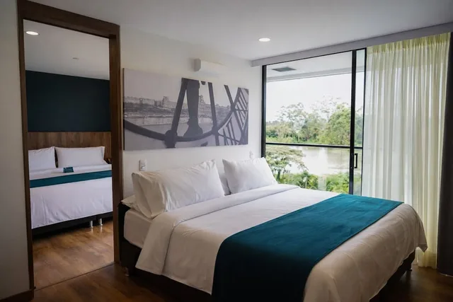 Family, Quadruple, King Bed, 2 Bathrooms، Hotel Lagoon Llanogrande 1/3