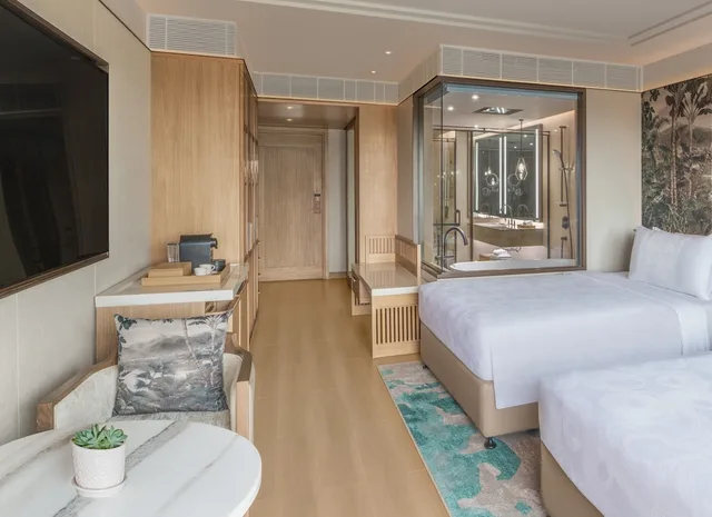 غرفة فاخرة بسريرين منفصلين بإطلالة على الفناء بشرفة، JW Marriott Goa Vagator 7/10