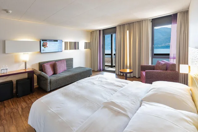غرفة كومفورت كبيرة بسرير فردي بإطلالة على البحيرة، Parkhotel Brenscino 2/3