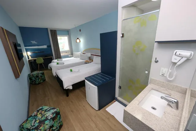 شقة ثلاثية، Golden Tulip Guaruja 1/1