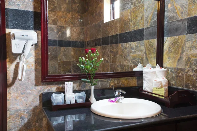 غرفة ديلوكس بسرير كينج بإطلالة على الحديقة، Lantern Boutique Hoi An 4/4