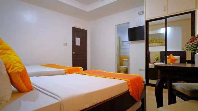غرفة ديلوكس بسرير مزدوج وسرير فردي، Boracay Holiday Resort 2/2