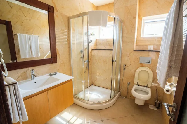جناح رئاسي بسرير كينج وسريرين كوين بإطلالة على البحر بـ3 غرف نوم بمطبخ، Kilua Beach Resort 7/9