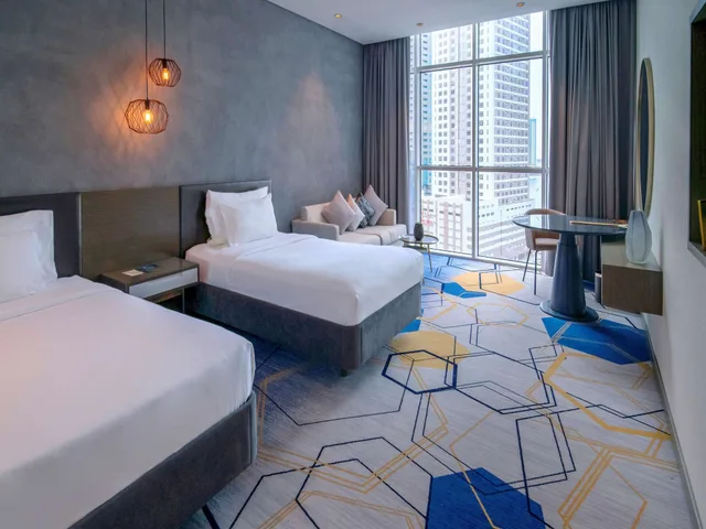 غرفة سوبيريور بسريرين منفصلين بإطلالة على المدينة، Pullman Hotel Sharjah 1/6