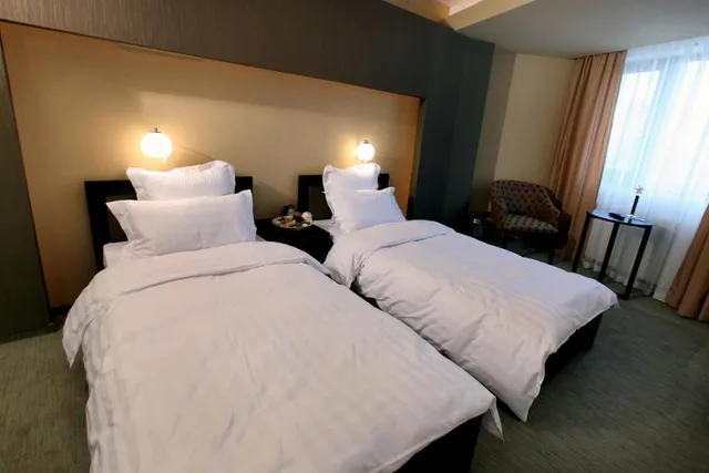 غرفة بسريرين منفصلين، Ambiance Hotel 1/4