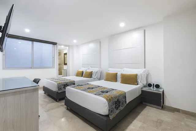 غرفة ثلاثية بسرير مزدوج وسرير فردي، Hotel Madeiro 2/10
