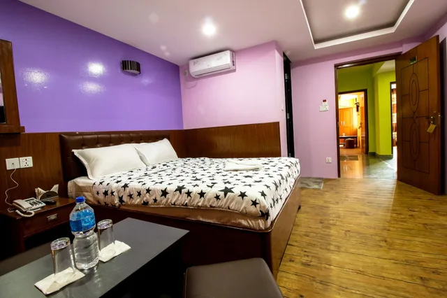غرفة ديلوكس بسرير مزدوج، Everest Holiday Inn 1/4