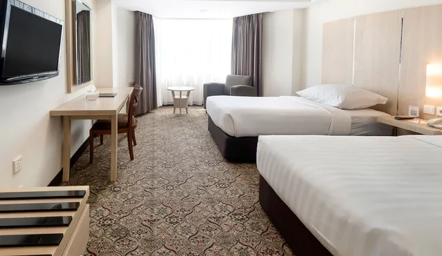 غرفة ديلوكس بسريرين منفصلين بغرفتي نوم، Hotel Pangeran Pekanbaru 4/7