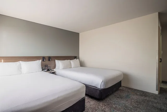 غرفة متصلة سوبيريور بسريرين كوين، Heartland Hotel Auckland Airport 3/7