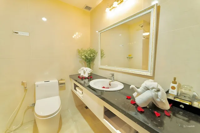 غرفة ديلوكس بسرير مزدوج وسرير فردي، Tuyet Son Hotel 9/9