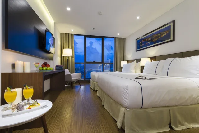 غرفة بريميير ثلاثية بسرير كوين وسرير فردي، Pavilion Hotel Da Nang 2/8