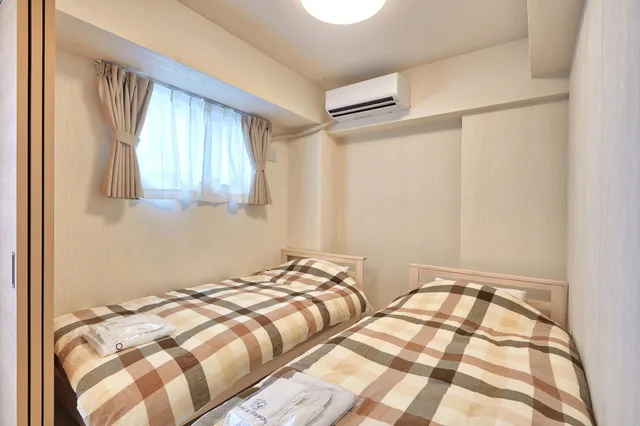 غرفة بسريرين منفصلين وفرشتي فوتون، Mango Resort Okinawa Chatan 1/5