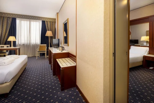 غرفة متصلة قياسية بسرير كينج وثلاثة أسرّة، Best Western Ctc Hotel Verona 4/6
