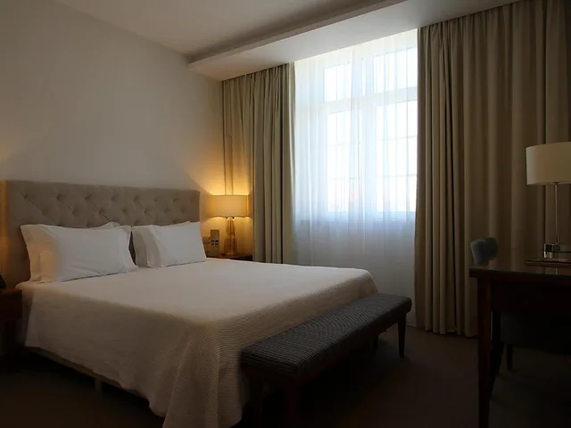 غرفة بريميوم بسرير كوين مع أريكة، Consolata Hotel 2/4