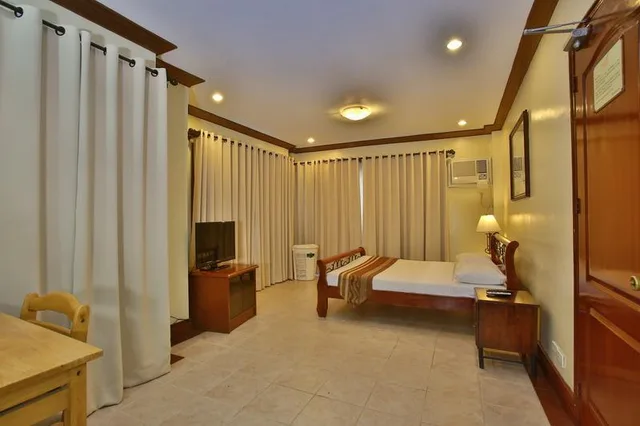 فيلا بسريرين مزدوجين مع أريكة، Crown Regency Suites Mactan 2/2