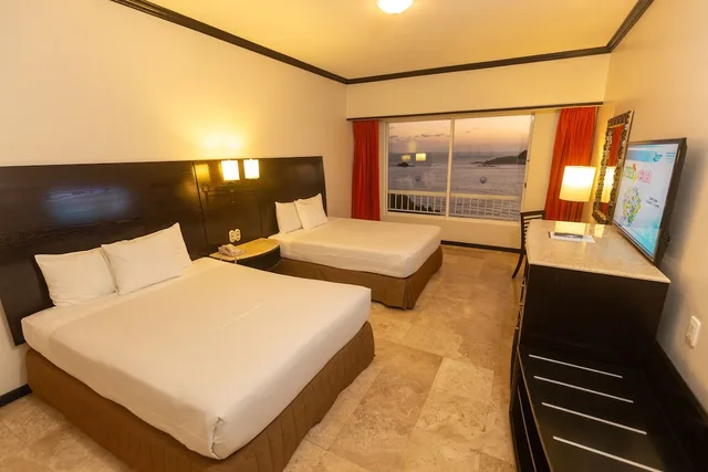 غرفة ديلوكس بسريرين مزدوجين بإطلالة على البحر، Azul Ixtapa Beach Resort Convention Center 3/5