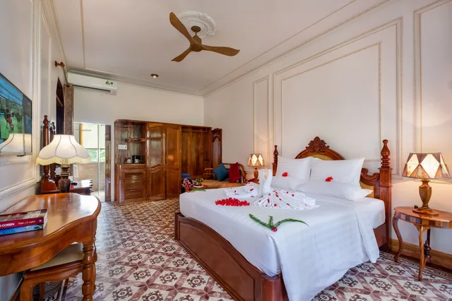 غرفة ديلوكس بسرير كينج بإطلالة جزئية على البحر، Coco Palm Beach Resort Spa 2/4