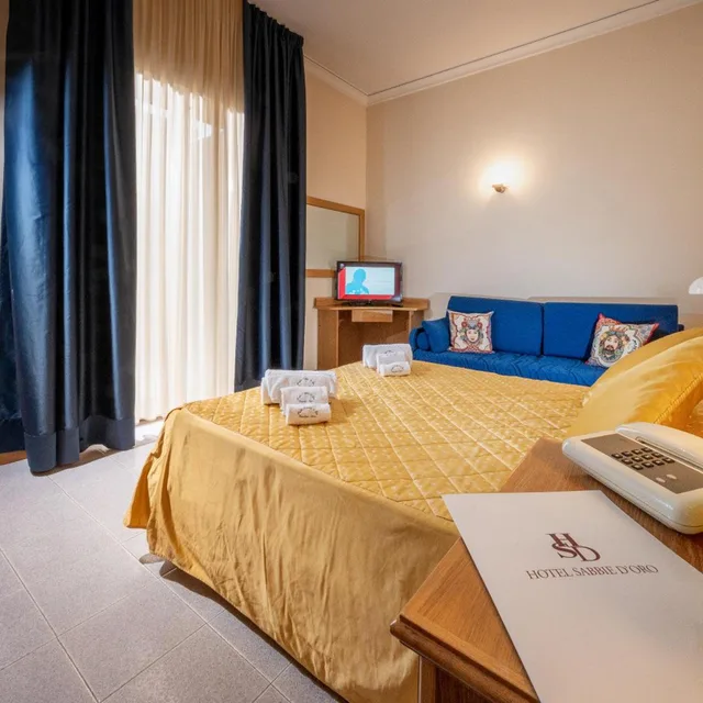 غرفة ثلاثية، Hotel Sabbie d Oro 3/10