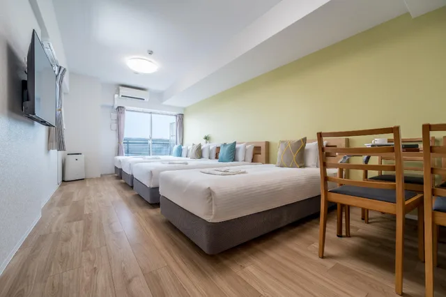 غرفة ديلوكس ثلاثية بسريرين مزدوجين، ESLEAD HOTEL Namba South III 2/3