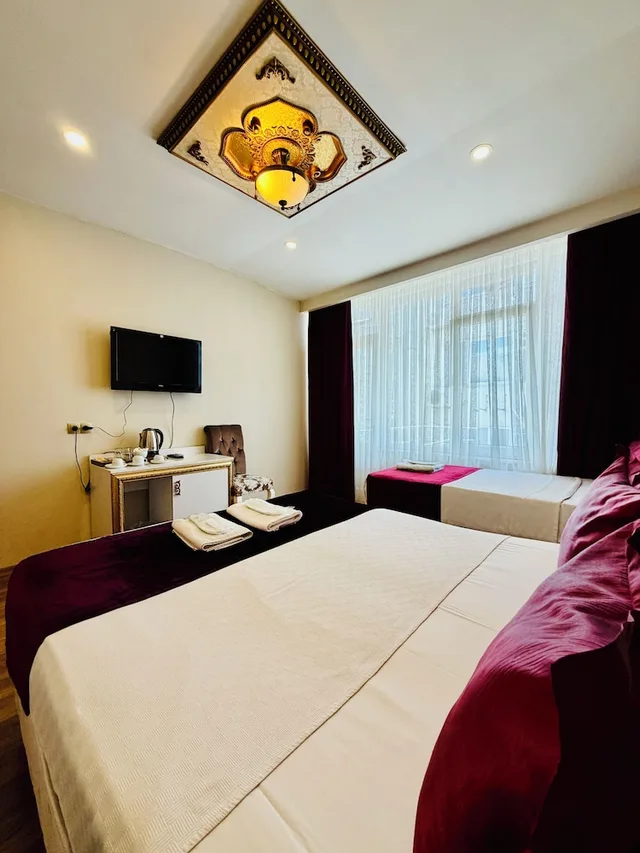 غرفة قياسية ثلاثية بثلاثة أسرّة، Marmara Deluxe Hotel 6/10
