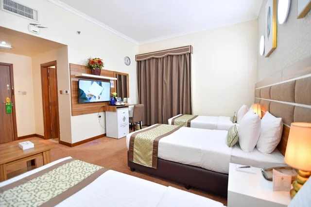غرفة ثلاثية بسرير فردي، NEJOUM AL EMARATE HOTEL 4/8