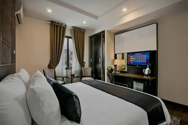 غرفة ديلوكس بسرير مزدوج أو سريرين منفصلين بإطلالة على المدينة، La Sante Hotel Spa 1/2