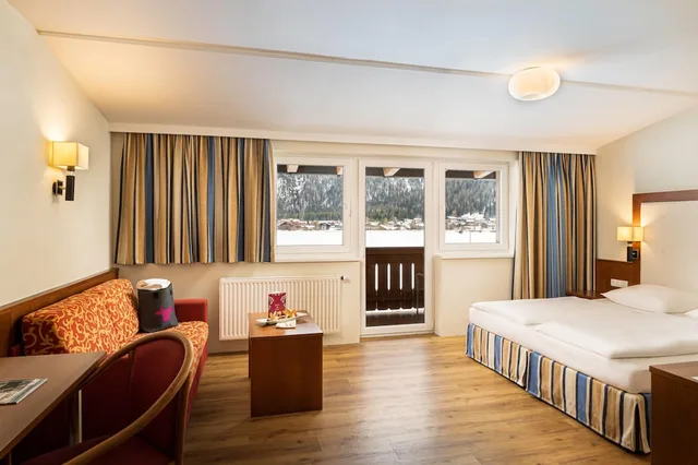 غرفة قياسية بسرير مزدوج بإطلالة على الجبل، elaya hotel steinplatte, Trademark by Wyndham 1/4