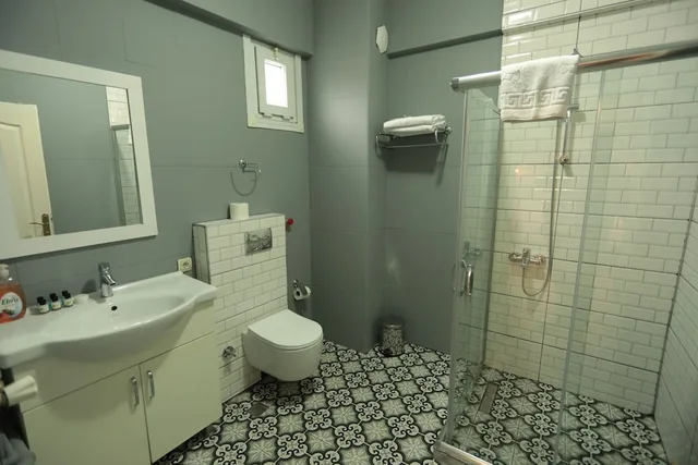 غرفة ديلوكس عائلية بسرير مزدوج وسرير فردي مع أريكة، White Pearl Apart 3/3