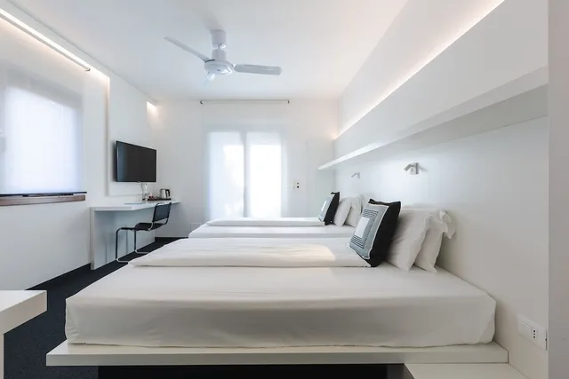 غرفة قياسية بسرير كوين وسرير فردي، Santoni Freestyle Hotel 1/9