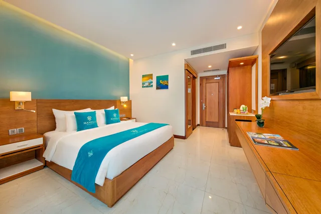 غرفة ديلوكس بسرير كينج بإطلالة جزئية على البحر، Mandila Beach Hotel Danang 8/10