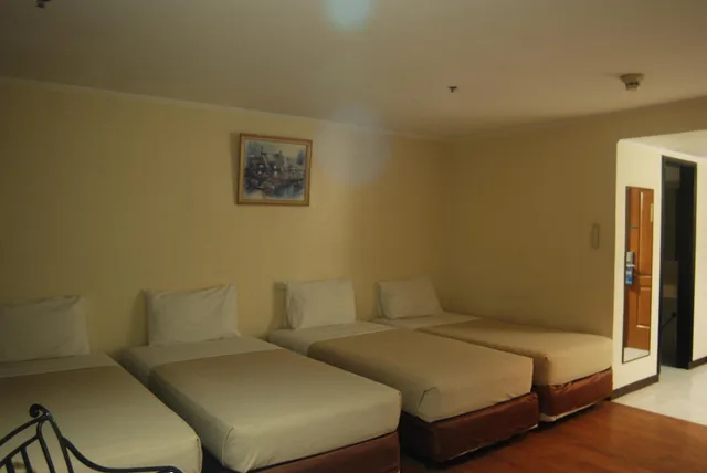 Deluxe Quadruple, Golden Peak Hotel and Suites powered by Cocotel 2/5