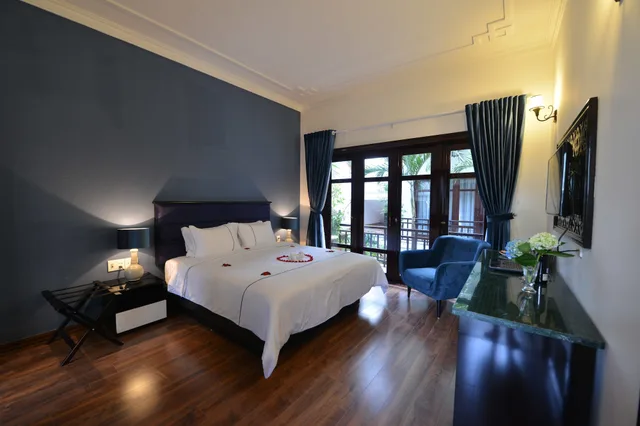 Deluxe, Queen Bed, TTC Hotel Hoi An 3/10