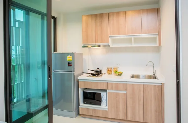 غرفة ديلوكس ثلاثية بسرير كوين وسرير فردي، Connext Residence 8/10