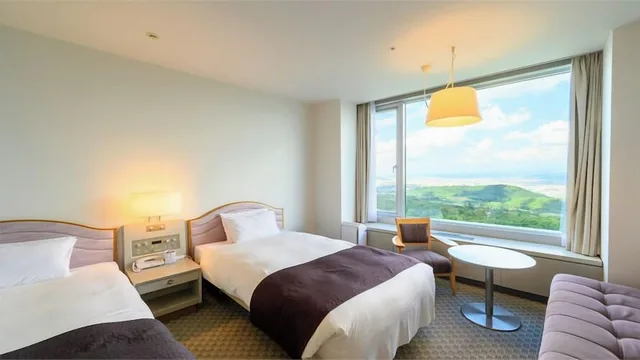غرفة ديلوكس بسريرين منفصلين بإطلالة على الجبل مع أريكة للمدخنين، Shin Furano Prince Hotel 3/5