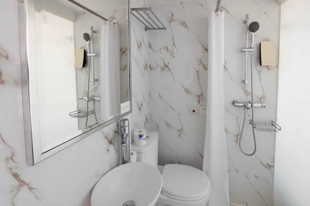 غرفة بسرير كوين في طابق مرتفع، Mini Causeway Bay Hotel 3/4