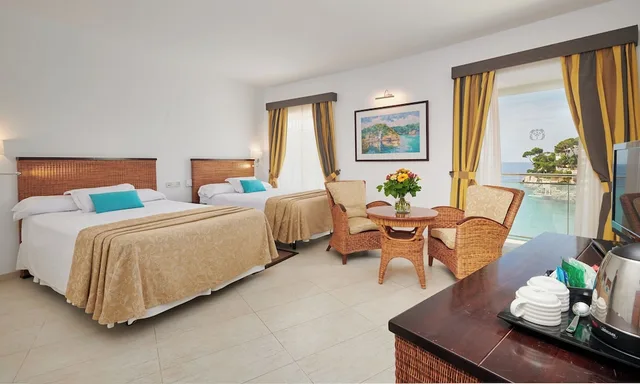 جناح كومفورت بسريرين مزدوجين بإطلالة على البحر بشرفة بغرفة نوم واحدة، Hotel Apartamentos Cala Santanyi 4/9