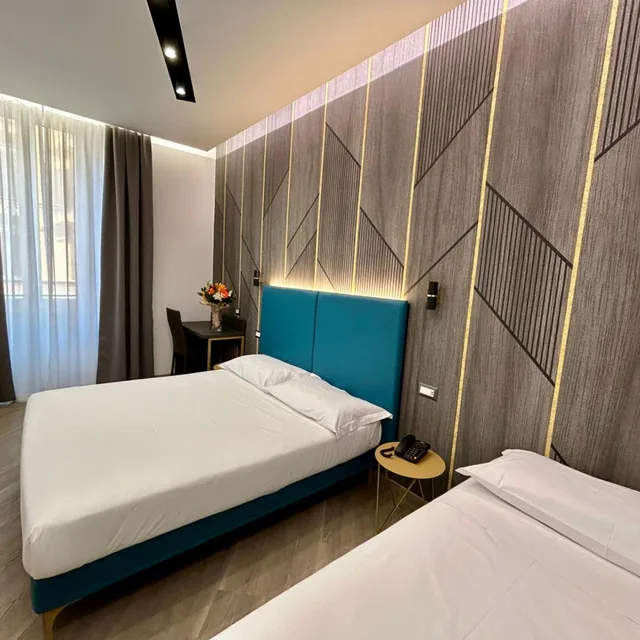 غرفة ديلوكس ثلاثية بسرير فردي، Hotel Contilia 1/3
