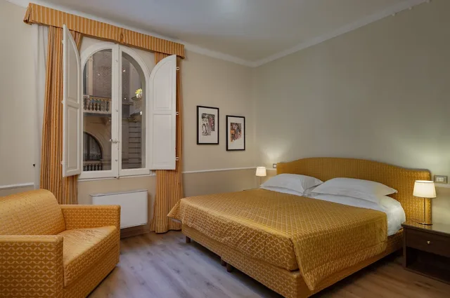 استوديو بسرير كوين وسرير فردي، Albergo Reggio 1/8