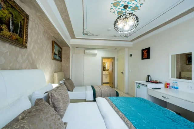 غرفة عائلية ثلاثية بسرير كوين وسرير فردي، Atam Suites Apart 8/10