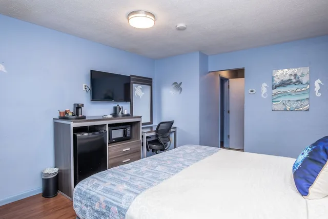 غرفة قياسية بسرير كينج بغرفتي نوم، Aqua Breeze Inn 3/5