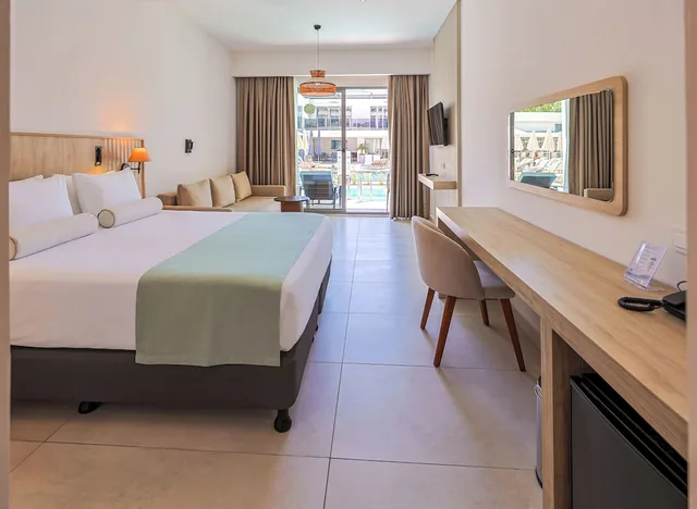 Elite, King Bed, Sofa, Victoria Princess Hotel Side - Adults Only 4/7