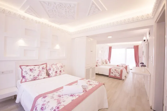 غرفة اقتصادية رباعية بسرير مزدوج وسريرين منفصلين، Aksoy Butik Otel 1/4