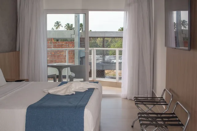 غرفة بريميوم بسرير كوين وسرير فردي بإطلالة على البحر، Maragogi Brisa Exclusive Hotel 5/8