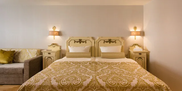 غرفة ديلوكس رباعية بسرير كينج وسرير كوين، Romantik Hotel Markusturm 7/10