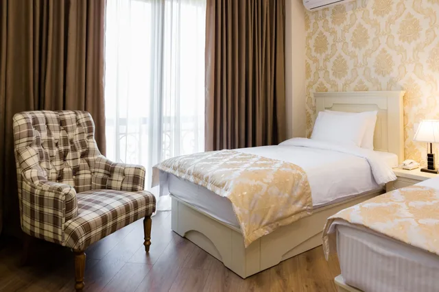 غرفة ديلوكس بسريرين منفصلين، Orchid Boutique Hotel 2/3